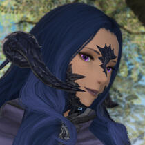 An Au Ra woman with dark scales, dark blue hair, and purple eyes. She has light skin with visible freckles, and her hair flows over her shoulders like a wave.
